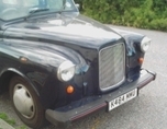 An old london taxi used as a runabout.
