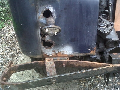 Rust at the base of a taxi front wing where it joins the front mounts.